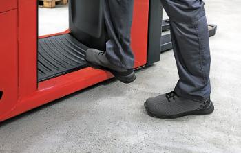 Pneumatically dampened driver’s platform